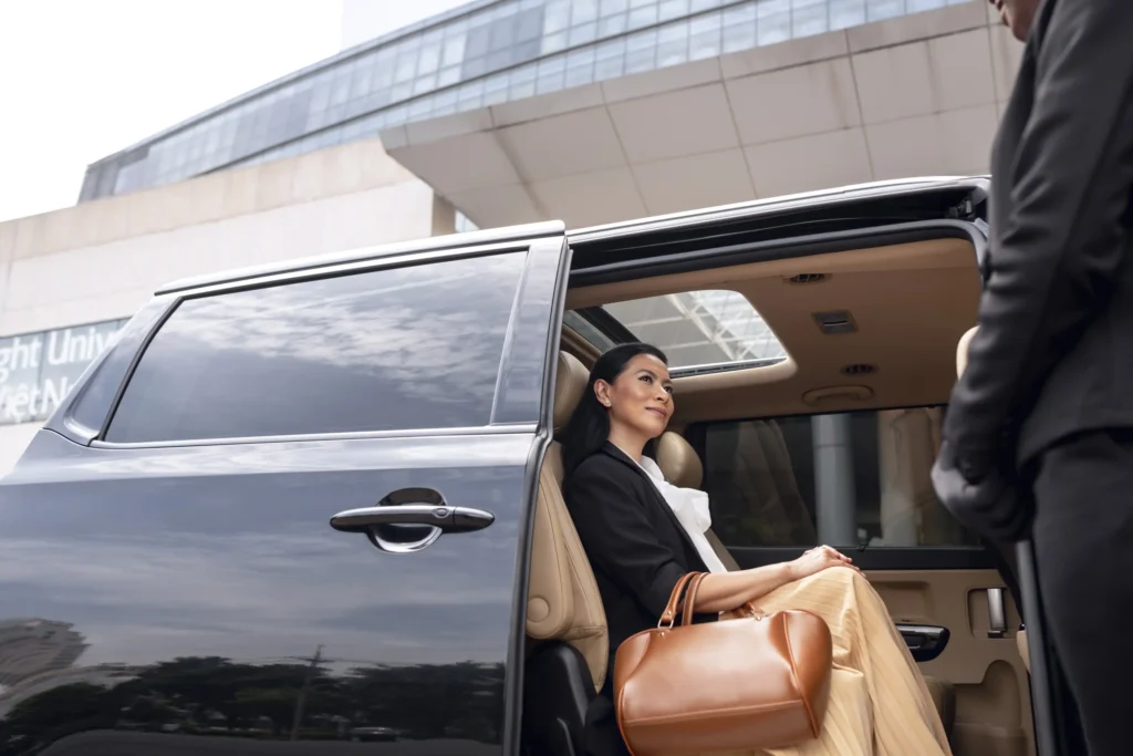 businesswoman getting taxi cab Horizontal 1024x683